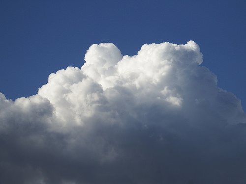 Big puffy cloud covering the sun